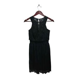 This black sleeveless dress by IN. San Francisco is  Size 3